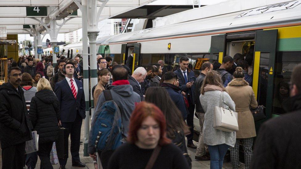 Commuters boarding train during a strike