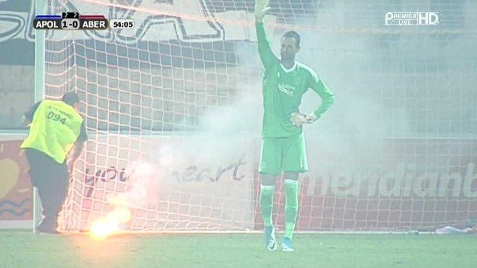 Flare in goal mouth