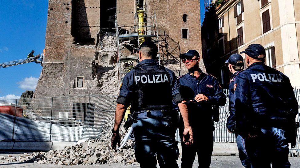 Firefighters work at the site after a section of the Torre dei Conti collapsed, near the Imperial Forum in Rome, Italy, 03 November 2025.