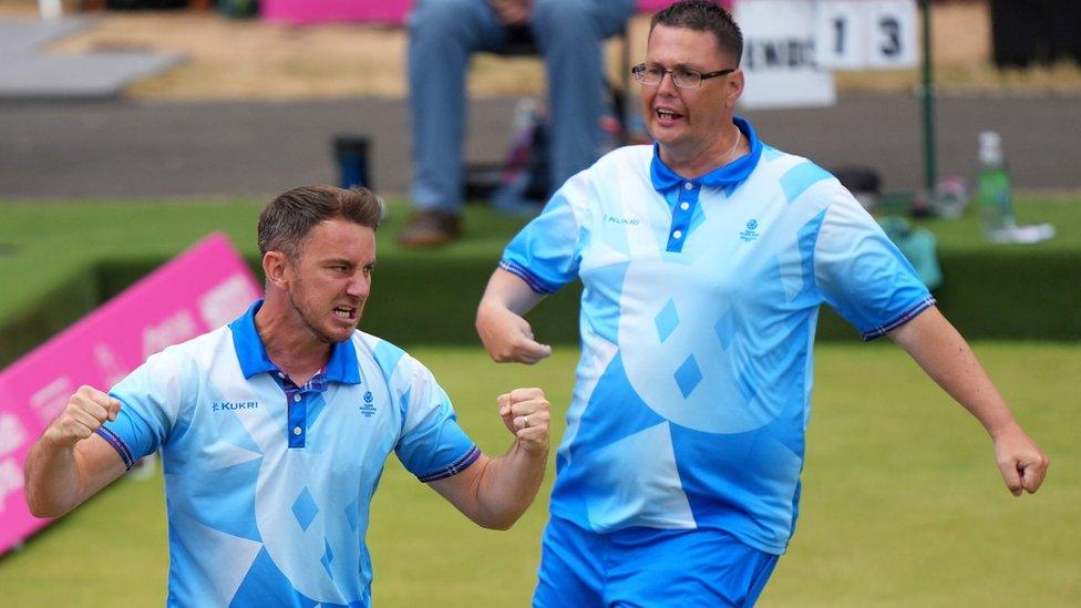 Garry Brown and Kevin Wallace celebrate winning gold for Scotland