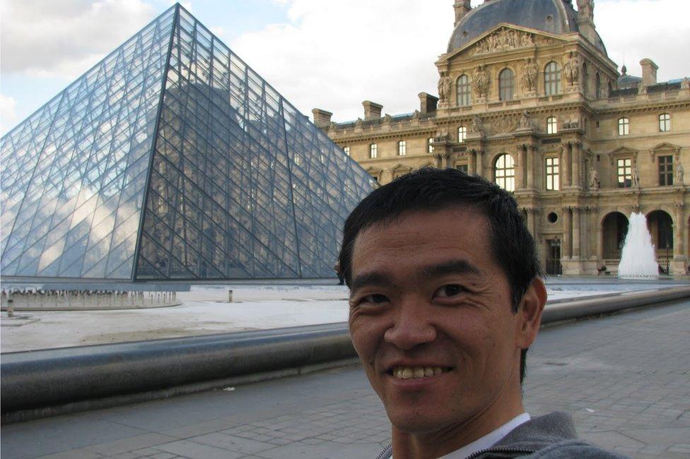 Ricardo Shimosakai outside the Louvre in Paris