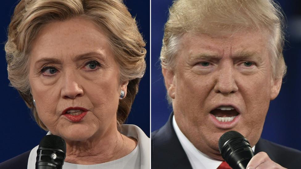 This file combination of pictures created on October 9, 2016 shows Democratic presidential nominee Hillary Clinton and Republican presidential nominee Donald Trump during the second presidential debate at Washington University in St. Louis, Missouri