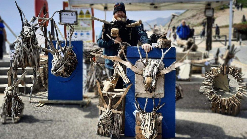 Display of art on West Bay beach