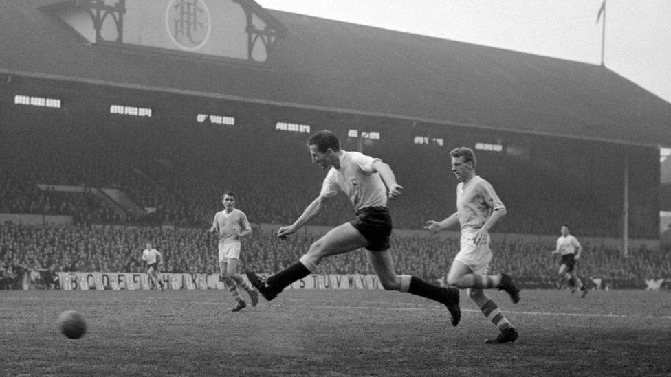 English League Division One match at White Hart Lane. Tottenham Hotspur 3 v Manchester City 1. Spurs winger Terry Medwin beats City's Branagan to score his side's third goal , 21st March 1959. (Photo by Charlie Ley/Mirrorpix/Getty Images)