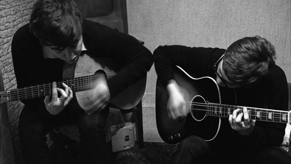 Sir Paul McCartney and John Lennon