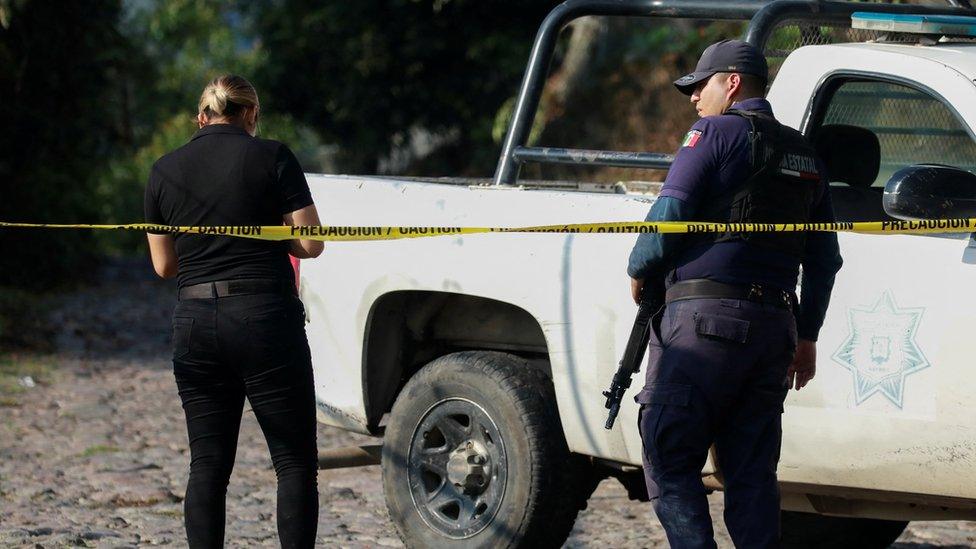 Police officers near the scene of where Luis Martín Sánchez's body was found