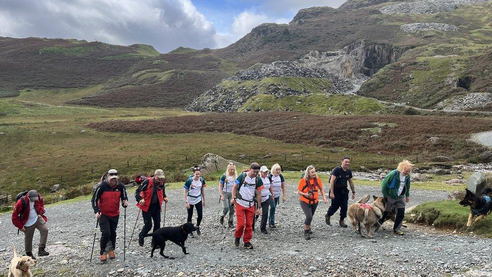 Walkers at base of Wetherlam