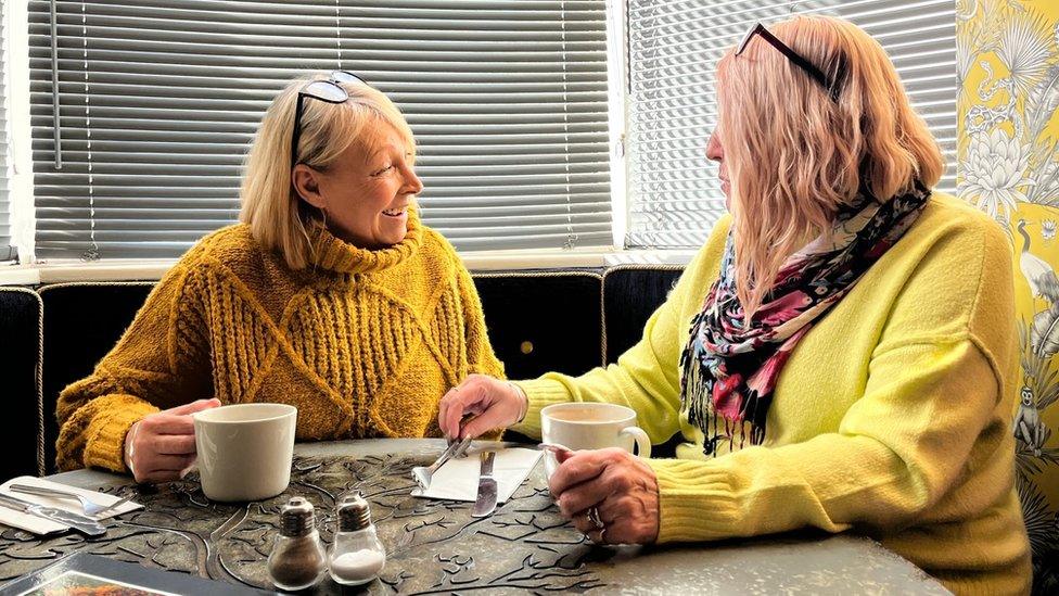 Kasha Gravill, left, with regular customer Christine Wilson