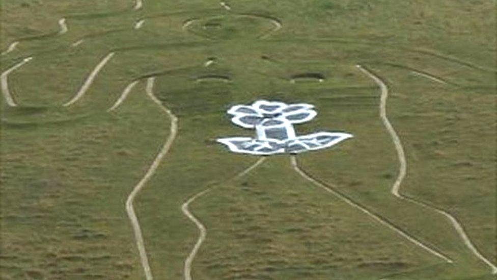 defaced Cerne Abbas giant