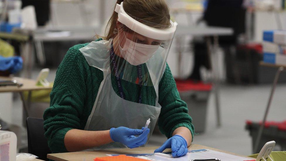 A student doing asymptomatic testing using lateral flow antigen at Edinburgh University