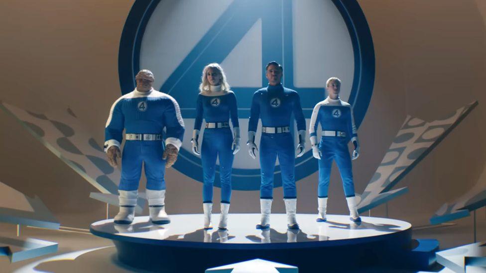 the fantastic four in superhero outfits