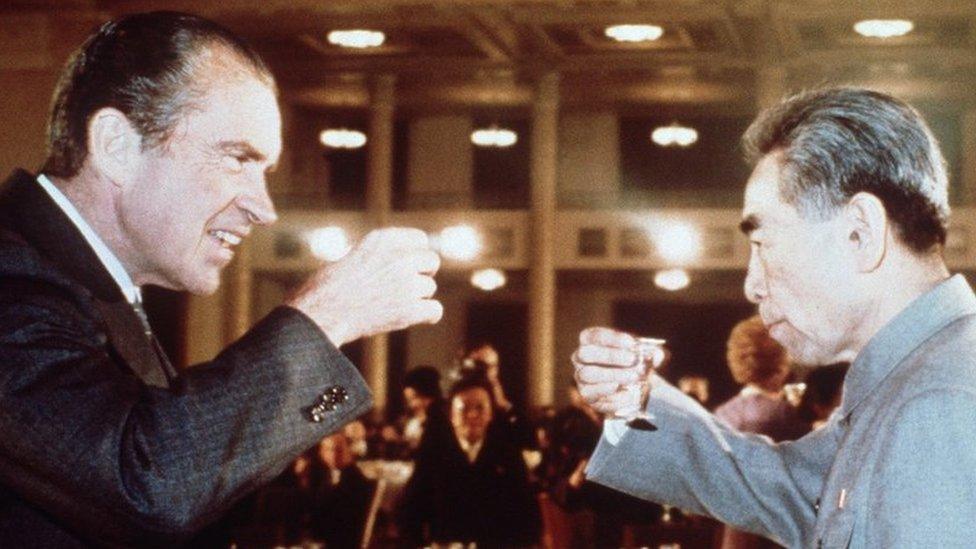 Richard Nixon (L) toasts with Chinese Premier Zhou Enlai (R) during his trip to China in February 1972.