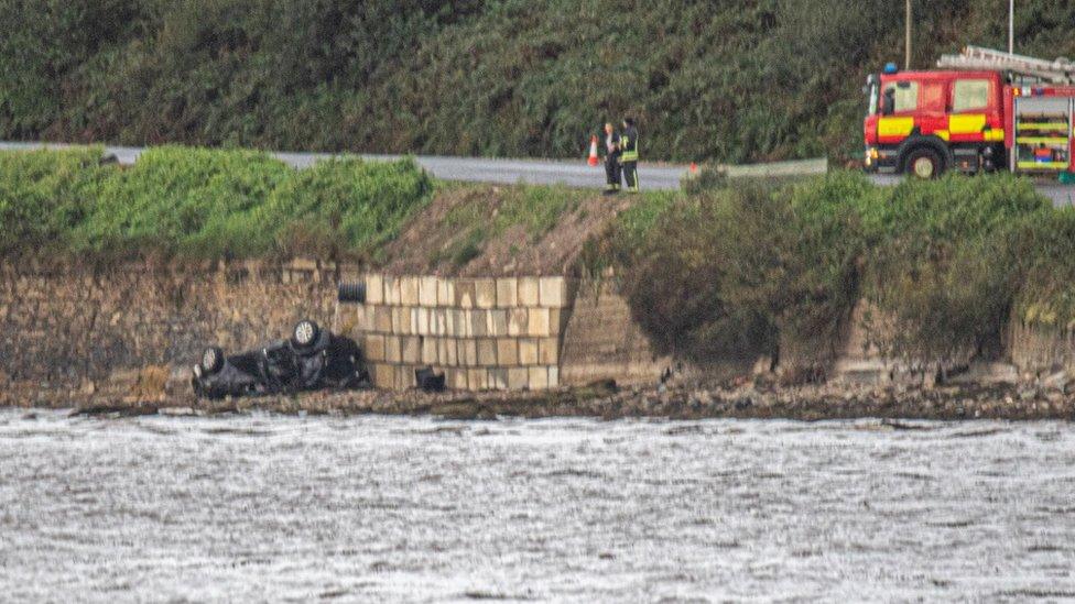 The family's car crashed down an embankment and into Lough Foyle