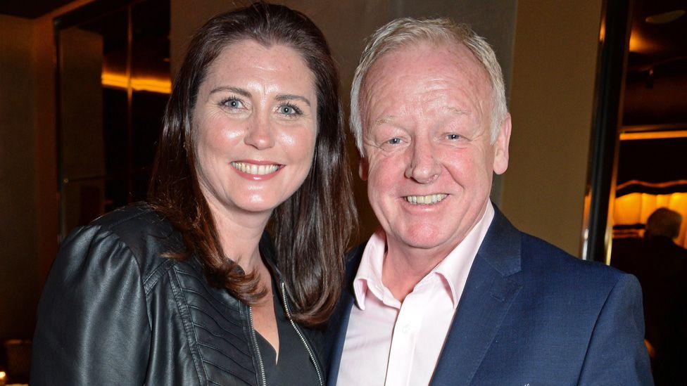 Claire Nicholson and Les Dennis standing together while guests at a theatre in 2018