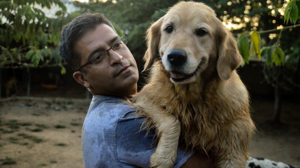 Rakesh Shukla with his first dog Kavya