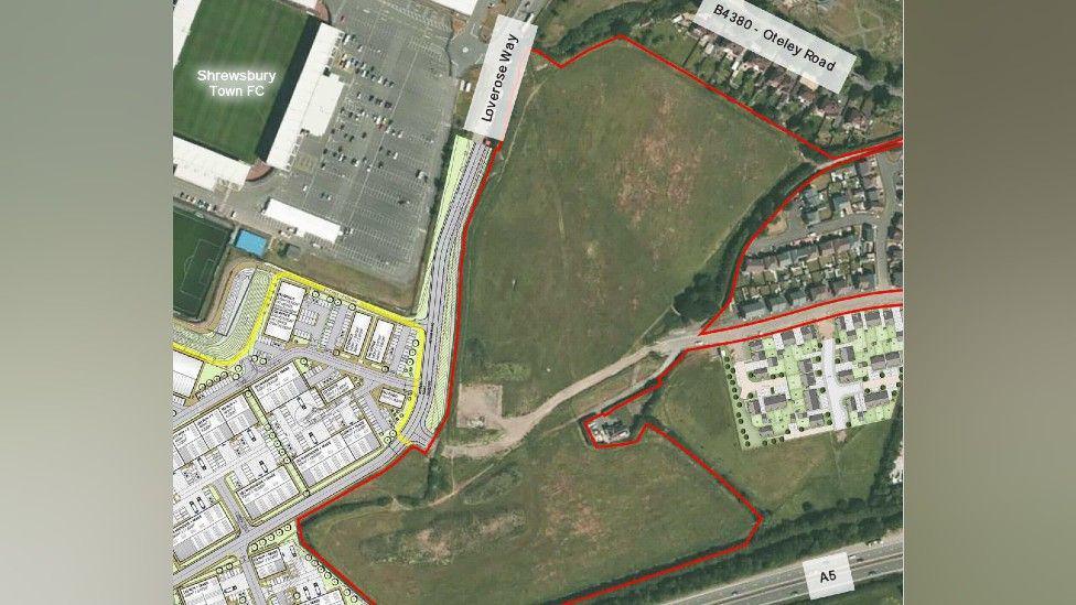 An aerial image of a green field space next to a green football pitch and car park. There is a red line around the field. Labels on its sides read "Loverose Way" and "B4380 Oteley Road"
