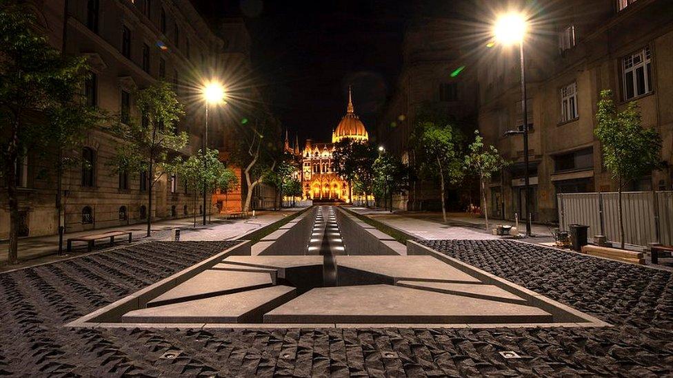 The new Monument of National Solidarity is directly in line with the main entrance of parliament