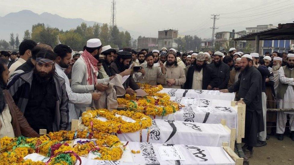 Relatives, Islamic parties, activists and residents prepare for the funeral of militants killed in a drone strike in the Lower Dir district of Khyber Pakhtunkhwa province (23 November 2015)