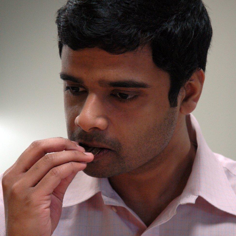 Sidhartha Nilakanta tastes a piece of chocolate