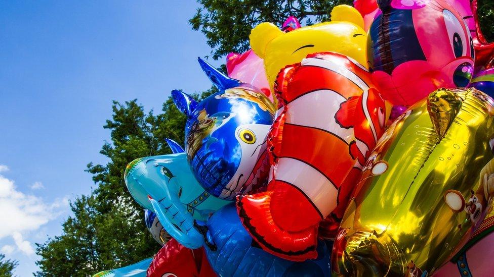 bunch-of-colourful-helium-balloons.