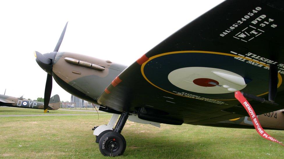 Spitfire and Blenheim bomber in background