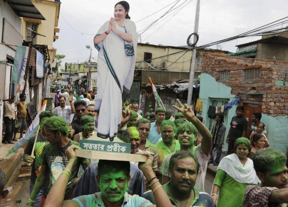 Trinamool Congress party supporters celebrate after winning the West Bengal state assembly election in Kolkata, India, Thursday, May 19, 2016.