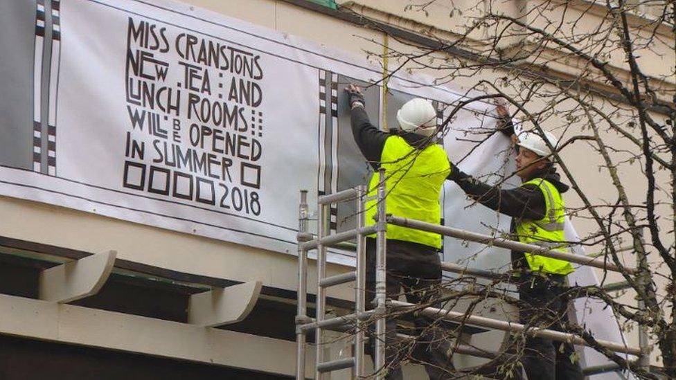 Workmen outside The Willow Tea Rooms