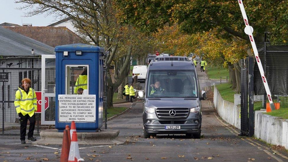 Members of the Home Affairs Select Committee are driven away following a visit to the Manston immigration short-term holding facility located at the former Defence Fire Training and Development Centre in Thanet, Kent.