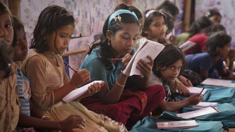 Rohingya refugees taking classes in one of the camps