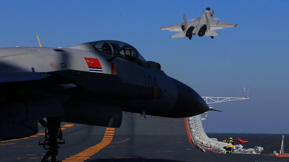 A live-fire drill using an aircraft carrier is seen carried out in the Bohai sea, China