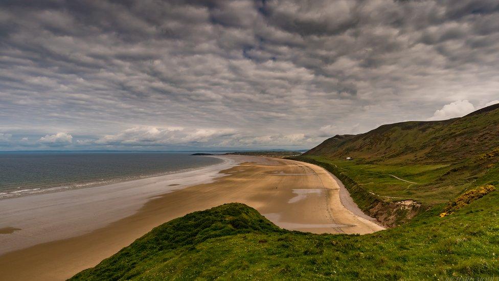 Clouds gather over Rhosilli bay