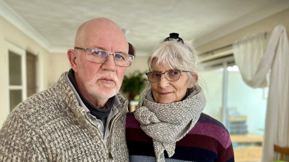 Simon and Kathy Kew at home