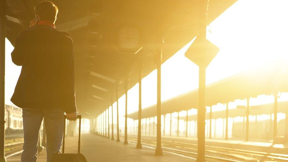 Man standing at station