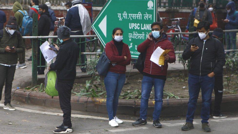 NEW DELHI, INDIA - JANUARY 7: Candidates leave the examination centre after appearing for the UPSC Exam at UPSC office Shahjaha Road on January 7,2022 in New Delhi, India. The Union Public Service Commission (UPSC) decided to go ahead with the UPSC Civil Services Main exams as per schedule. The UPSC CSE Main exams will be held on January 7, 8, 9, 15, and 16. (Photo by Sonu Mehta/Hindustan Times via Getty Images)