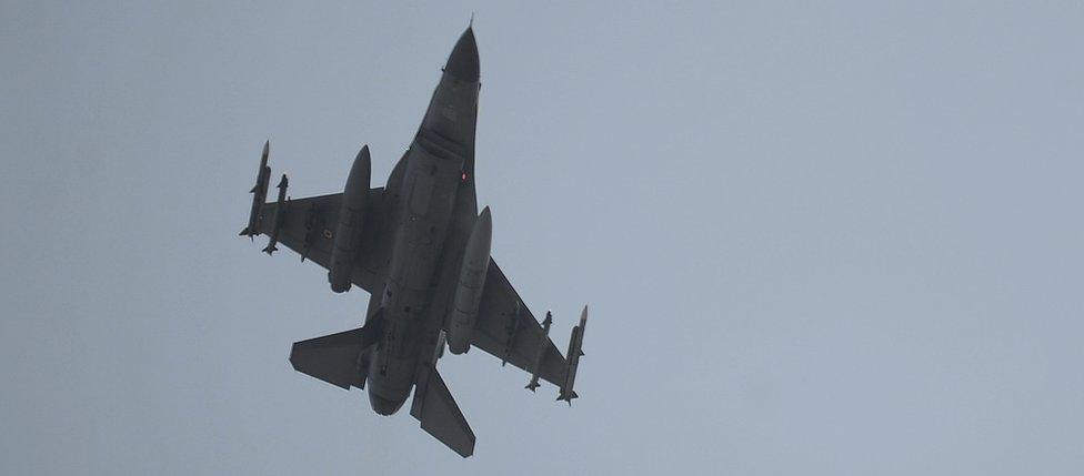 A Turkish Air Force fighter plane flies over the Incirlik Air Base, in Adana, southern Turkey, Thursday, 13 August 2015.