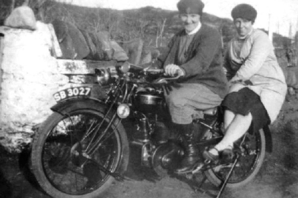 Two nurses on a motorbike