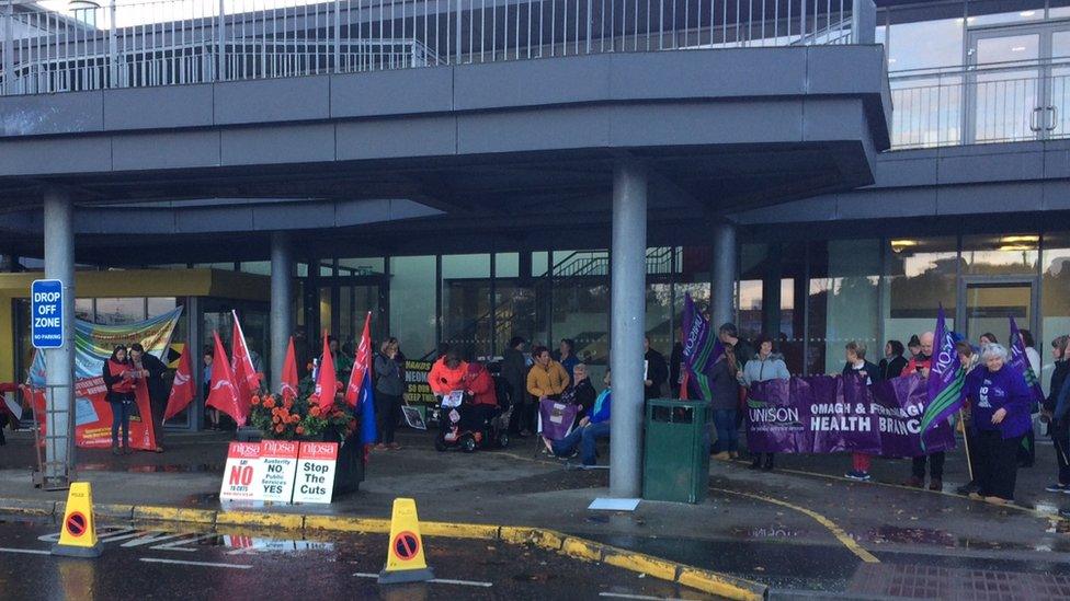 People gathered outside the Lakeland Forum leisure centre ahead of the trust meeting