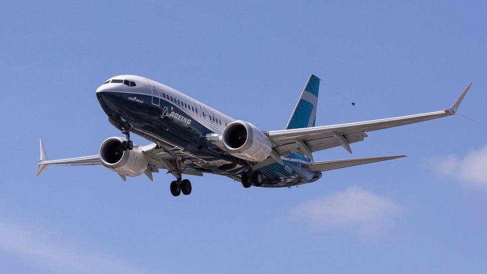 A 737 Max lands after a test flight at Boeing Field in June 2020