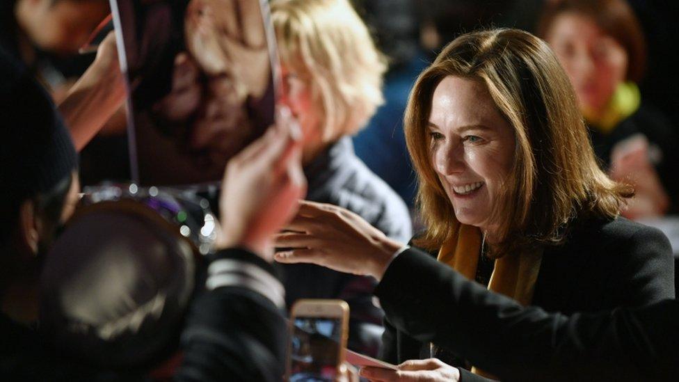 US film producer Kathleen Kennedy signs autographs to fans during the red carpet at Tokyo screening of Star Wars