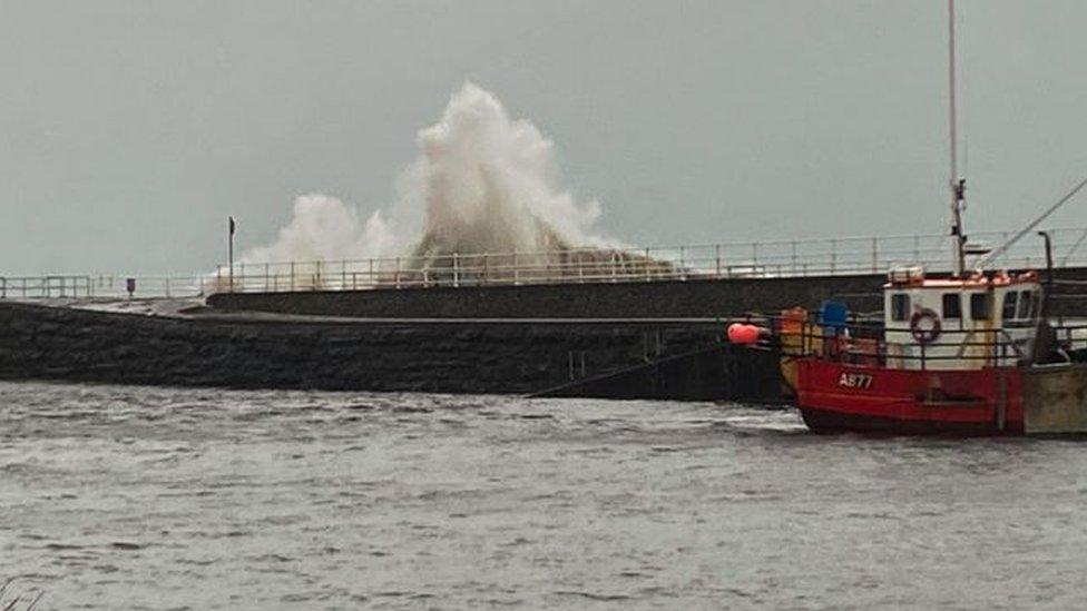 Waves crash on the front at Aberystwyth