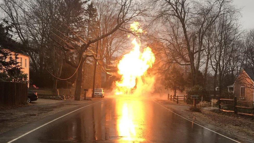 Gas line catching fire after power line downed in Massachusetts, US, storm, 3 March 2018