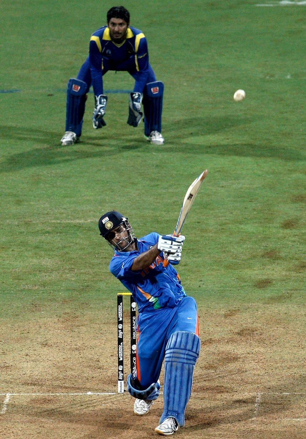 .S Dhoni, captain of India hits the winning runs watched by Kumar Sangakkara captain of Sri Lanka to secure victory during the 2011 ICC World Cup Final between India and Sri Lanka played at Wankhede Stadium on April 2, 2011 in Mumbai, India.