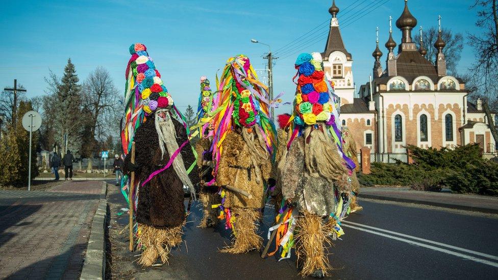 "Bearded Men" parade in the streets of Slawatycze, in Lublin region, Poland, 31 December 2016. "Bearded Men" is an old local tradition, passed from generation to generation. During last three days of December citizens of Slawatycze disguised in special costumes, say goodbye to the Old Year and make wishes for the New Year.