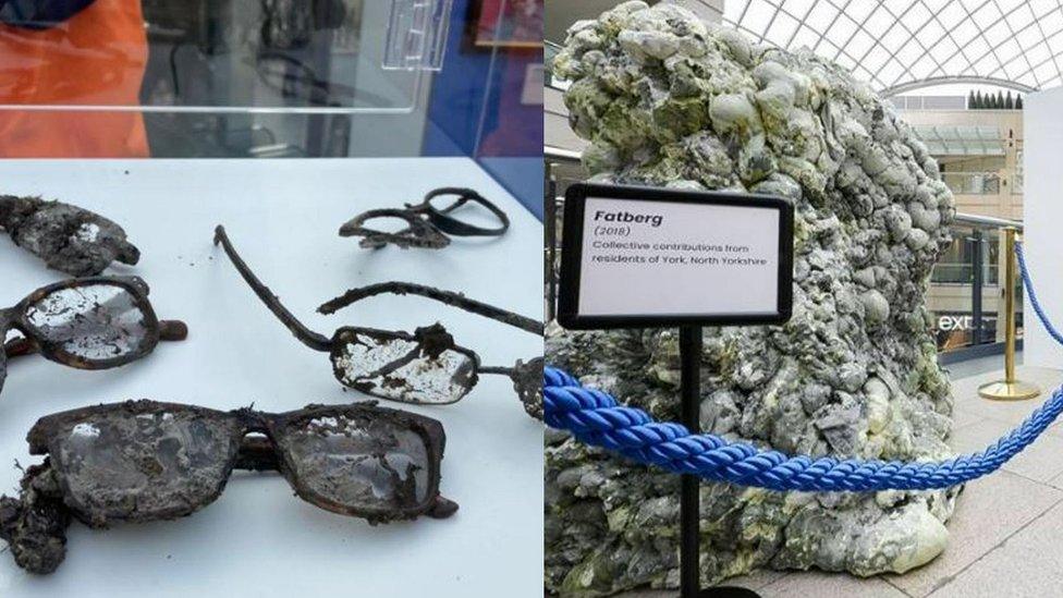 Cabinet of spectacles next to Fatberg on display in Leeds