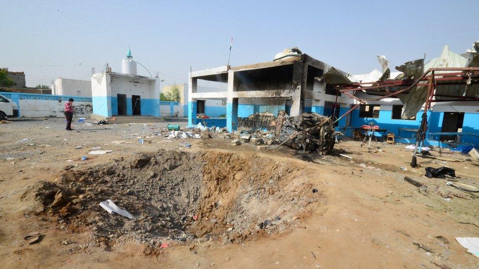 A crater caused by a Saudi-led coalition air strike is seen at the yard of a hospital operated by Medecins Sans Frontieres in the Abs district of Hajja province, Yemen August 16, 2016.