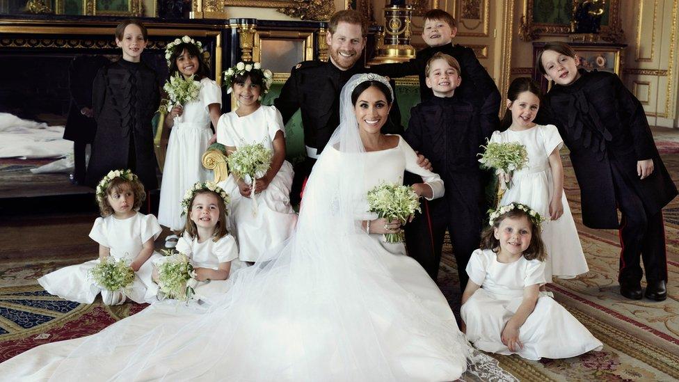 The couple with all their bridesmaids and page boys