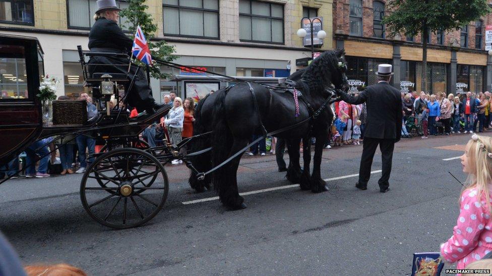 Horses and Carriage brought a touch of nostalgia to the parade as it headed down Royal Avenue.