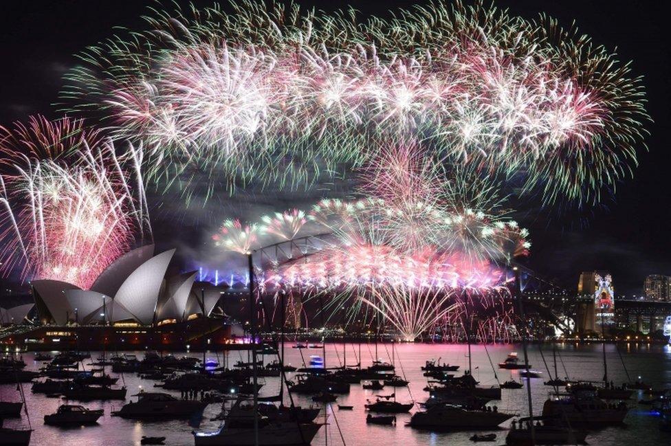 This file photo taken on January 1, 2016 shows fireworks lighting up the sky over Sydney's Opera House (left) and Harbour Bridge during New Year celebrations in Sydney.