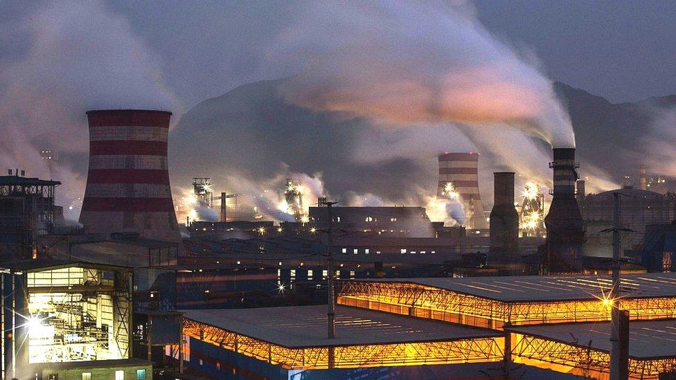 Coal emissions billowing from a steel factory in Hebei, China