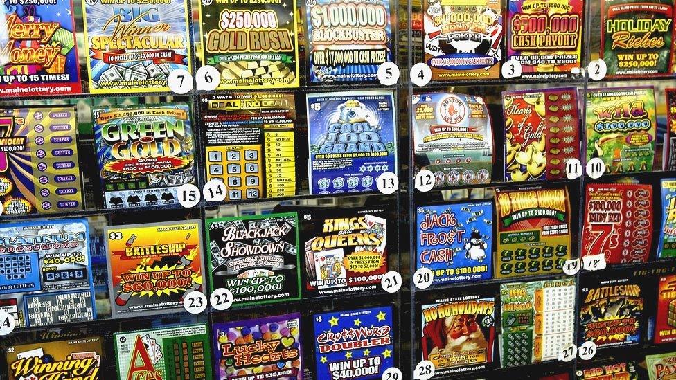 A number of American scratch cards on display in a store